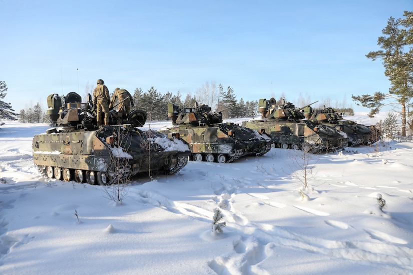 U.S. Army Soldiers assigned to 2nd Platoon, Chosen Company, 1st Battalion, 12th Cavalry Regiment, 3rd Armored Brigade Combat Team, stage their Bradley Fighting Vehicles in support of Unified Partners '26, Jan. 17, 2026 on Camp Taurus Training Area, Pabradė, Lithuania. Unified Partners '26 continued to strengthen the enduring partnership between the U.S. and Lithuania, reaffirming a shared commitment to collective defense, regional security, and the strength of the NATO Alliance. (U.S. Army photo by Sgt. Asher Atkinson)