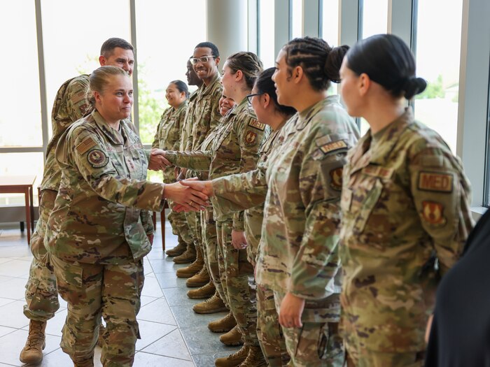 Lt. Gen. Linda S. Hurry, then Air Force Materiel Command Deputy Commander (left) greets Airmen inside the 72nd Medical Group at Tinker Air Force Base, Oklahoma, April 26, 2024. This was Hurry’s first visit to Tinker following her recent assignment to AFMC. (Photo by Clayton Cummins)