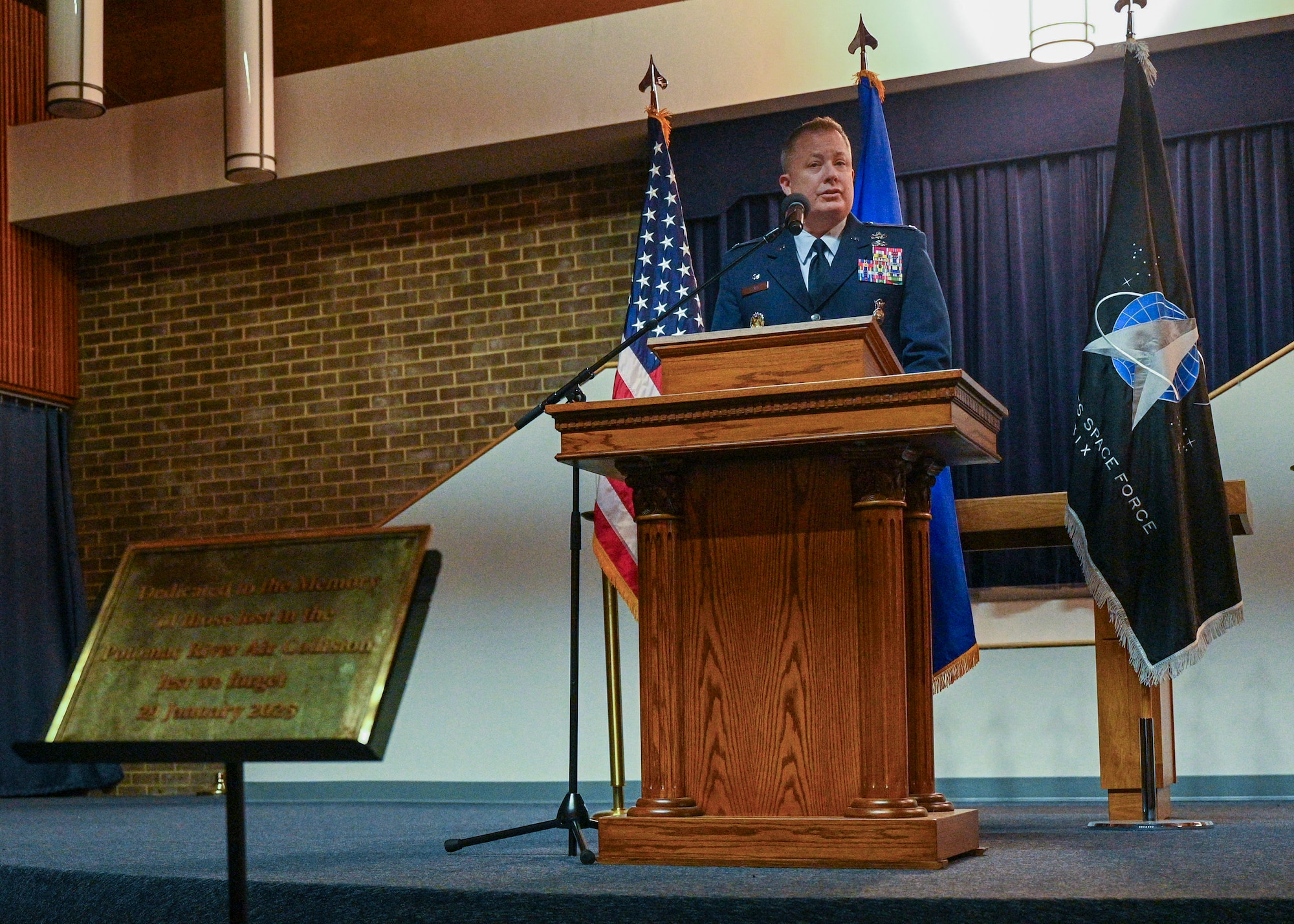 U.S. Air Force Col. James M. Clark, commander of Joint Base Anacostia Bolling and the 11th Wing, delivers opening remarks during the remembrance ceremony honoring the victims of the 2025 Potomac River aircraft collision at JBAB, Washington, D.C., Jan. 29, 2026. Sixty-seven people were killed when American Airlines Flight 5342 and a U.S. Army UH-60L helicopter collided near Ronald Reagan Washington National Airport in Arlington, Va., Jan. 29, 2025. The ceremony marked the one-year anniversary of the incident and concluded with a candlelight memorial for the victims. (U.S. Air Force photo by Airman 1st Class Shanel Toussaint)