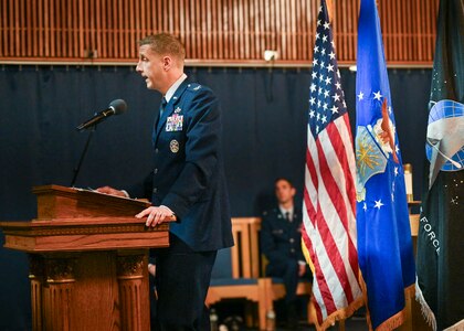 U.S. Air Force Col. Ryan A.F. Crowley, former commander of Joint Base Anacostia-Bolling and the 11th Wing, delivers remarks during the remembrance ceremony honoring the victims of the 2025 Potomac River aircraft collision at JBAB, Washington, D.C., Jan. 29, 2026. Crowley served as the base commander at the time of the incident and led the base’s response mission. Sixty-seven people were killed when American Airlines Flight 5342 and a U.S. Army UH-60L helicopter collided near Ronald Reagan Washington National Airport in Arlington, Va., Jan. 29, 2025. (U.S. Air Force photo by Airman 1st Class Shanel Toussaint)