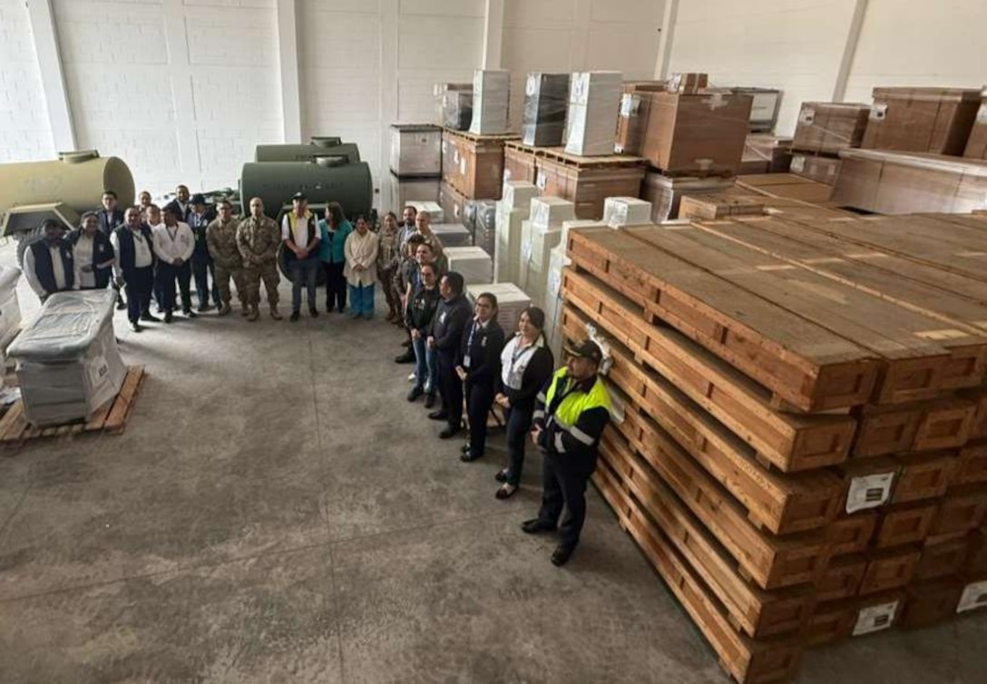 A photo taken above of people standing side by side .