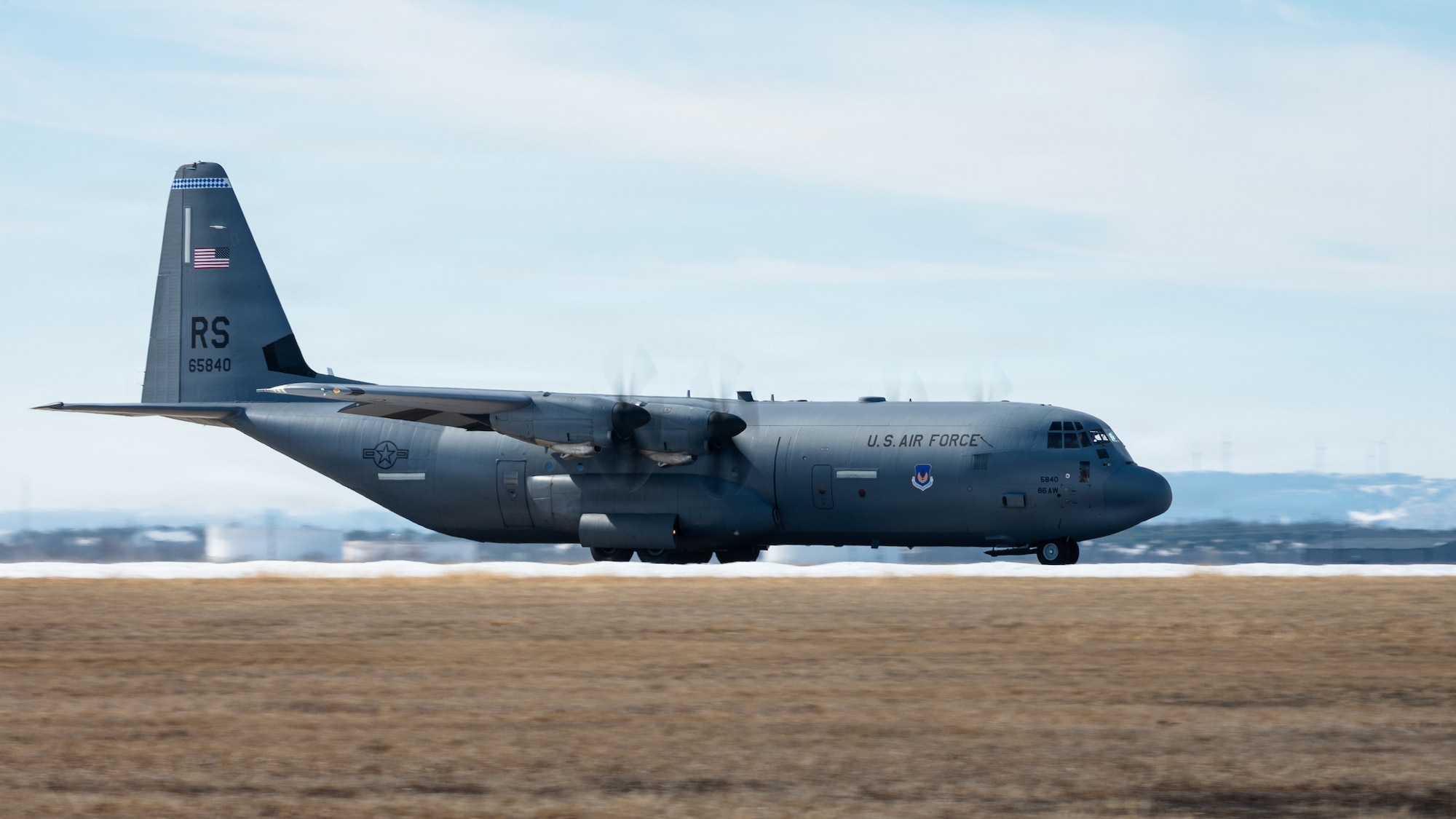 A U.S. Air Force C-130J Super Hercules departs after the airfield reopened following Winter Storm Fern at Dyess Air Force Base, Texas, Jan. 28, 2026. The 7th Civil Engineer Squadron accelerated airfield recovery timelines despite sustained below-freezing temperatures during winter storm recovery operations. (U.S. Air Force photo by Senior Airman Jade M. Caldwell)
