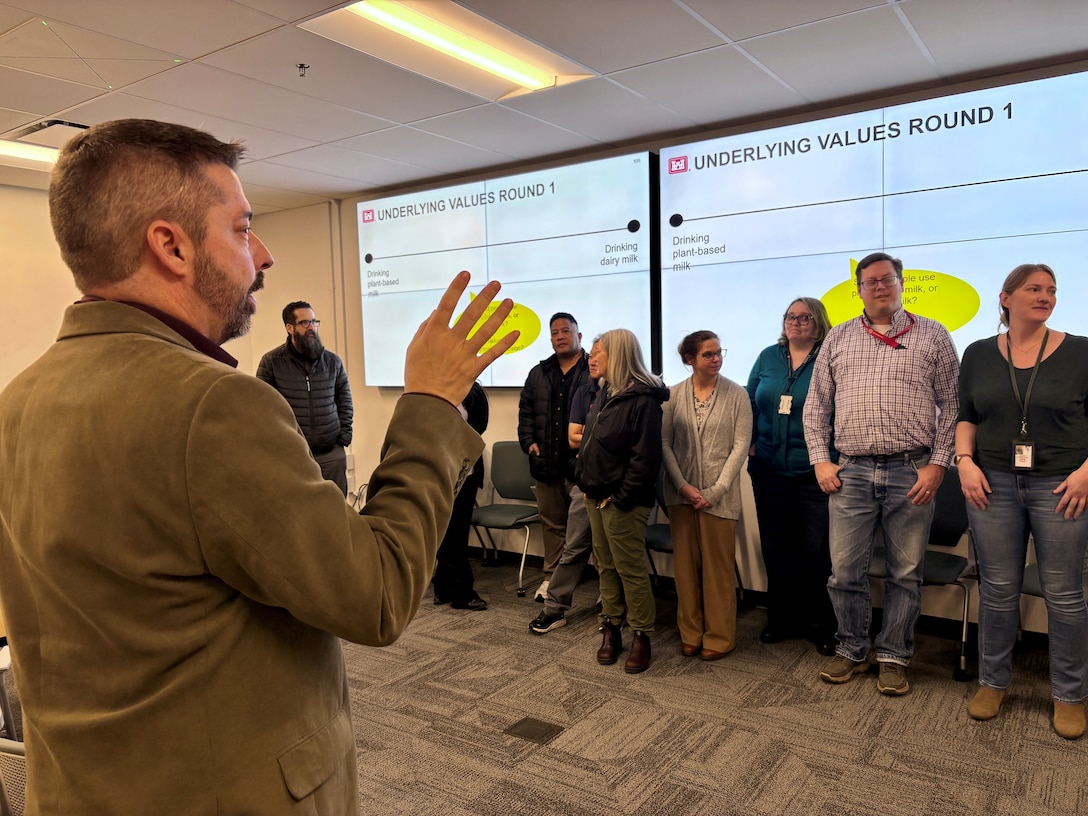 Course instructors Dave Nelson, Stacy Langsdale and Jenn Miller stand together during the Effective Communication for the FUDS Program training at the U.S. Army Corps of Engineers Sacramento District.
