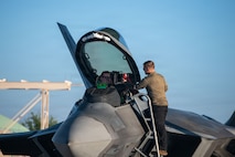 A U.S. Air Force F-22 Raptor pilot assigned to the 19th Fighter Squadron, prepares for a training sortie during exercise Sentry Aloha 26-1 at Joint Base Pearl Harbor-Hickam, Hawaii, Jan. 27, 2026.