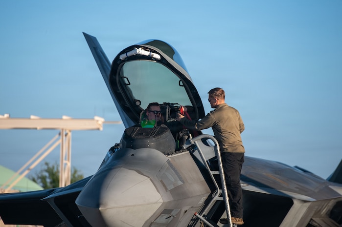 A U.S. Air Force F-22 Raptor pilot assigned to the 19th Fighter Squadron, prepares for a training sortie during exercise Sentry Aloha 26-1 at Joint Base Pearl Harbor-Hickam, Hawaii, Jan. 27, 2026.