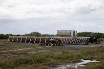 U.S. Marines with Marine Wing Support Squadron 171, Marine Aircraft Group 12, 1st Marine Aircraft Wing, set up a forward arming and refueling point during an Aviation Training Relocation program at Tinian, Northern Mariana Islands, January 16, 2026.