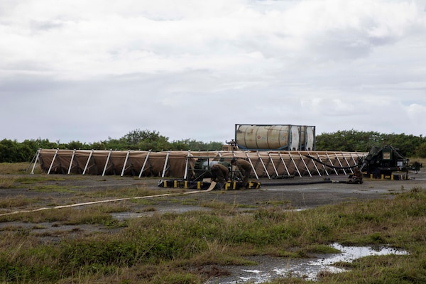 U.S. Marines with Marine Wing Support Squadron 171, Marine Aircraft Group 12, 1st Marine Aircraft Wing, set up a forward arming and refueling point during an Aviation Training Relocation program at Tinian, Northern Mariana Islands, January 16, 2026.