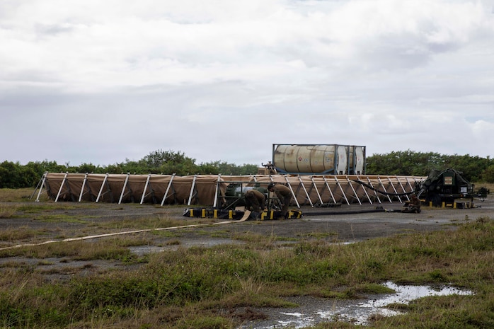 U.S. Marines with Marine Wing Support Squadron 171, Marine Aircraft Group 12, 1st Marine Aircraft Wing, set up a forward arming and refueling point during an Aviation Training Relocation program at Tinian, Northern Mariana Islands, January 16, 2026.