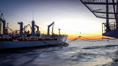 Henry J. Kaiser-class underway replenishment oiler USNS Patuxent (T-AO 201), left, refuels Whidbey Island-class dock landing ship USS Comstock (LSD 45) during a replenishment-at-sea operation in the Pacific Ocean, Jan. 31, 2026. The 11th Marine Expeditionary Unit is currently underway aboard the Boxer Amphibious Ready Group in the U.S. 3rd Fleet area of operations conducting integrated training that enhances lethality and warfighting readiness. (U.S. Marine Corps photo by Sgt. Trent A. Henry)