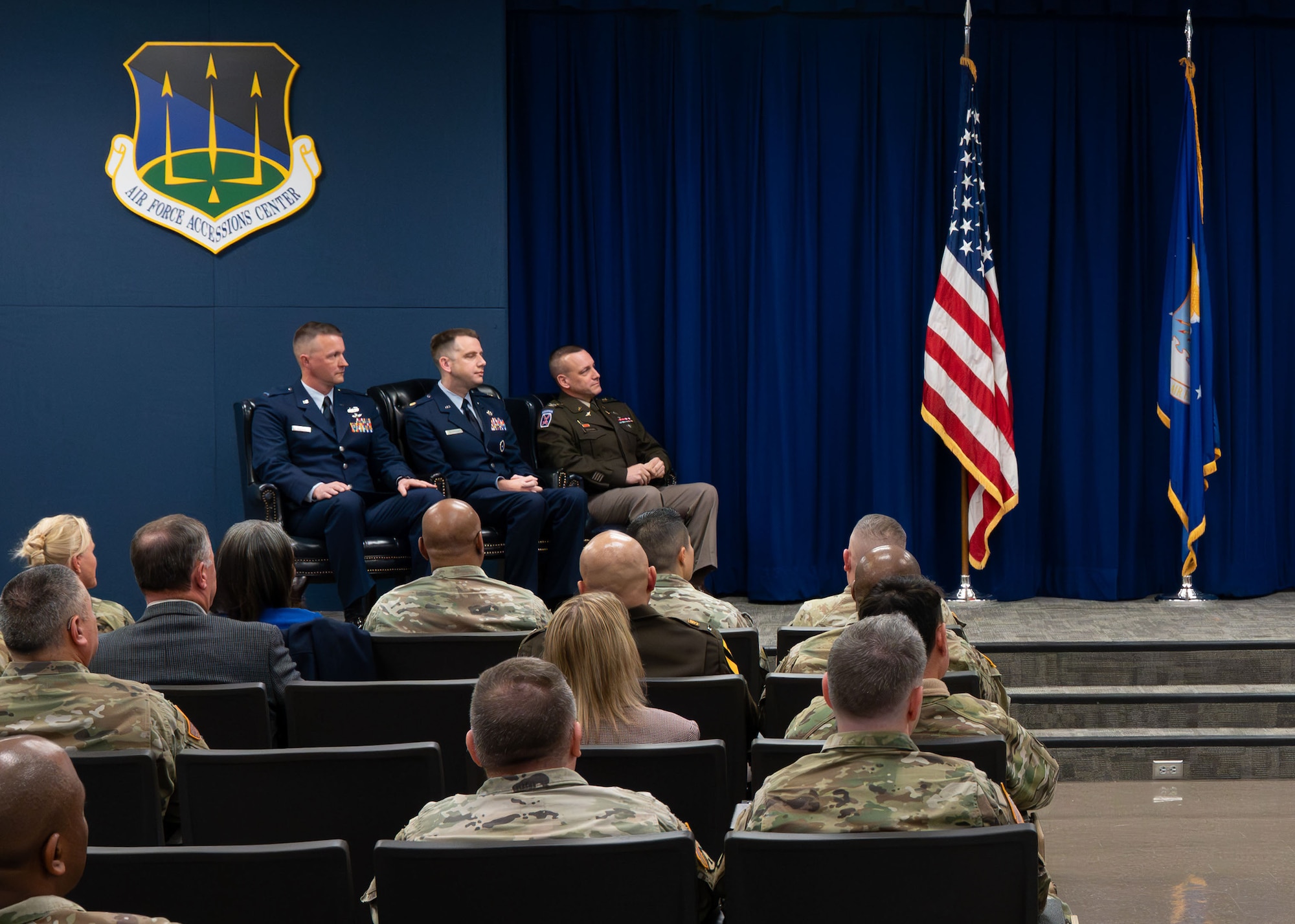 From left, U.S. Air Force Chief Warrant Officer 5, Jason Godwin, Warrant Officer Training
School advisor to the commandant, Maj. Tanner Allshouse, WOTS commandant, and U.S. Army Col. Kevin McHugh, Warrant Officer Career College commandant, participate in a transfer of service ceremony at Maxwell Air Force Base, Alabama, Jan. 30, 2026. The ceremony represented the trust placed in Godwin, whose career spans more than two decades of technical aviation expertise, joint operations and strategic leadership across the U.S. Army, National Guard, Army Reserve and now the Air Force. (U.S. Air Force photo by Airman 1st Class Nelvis Sera)