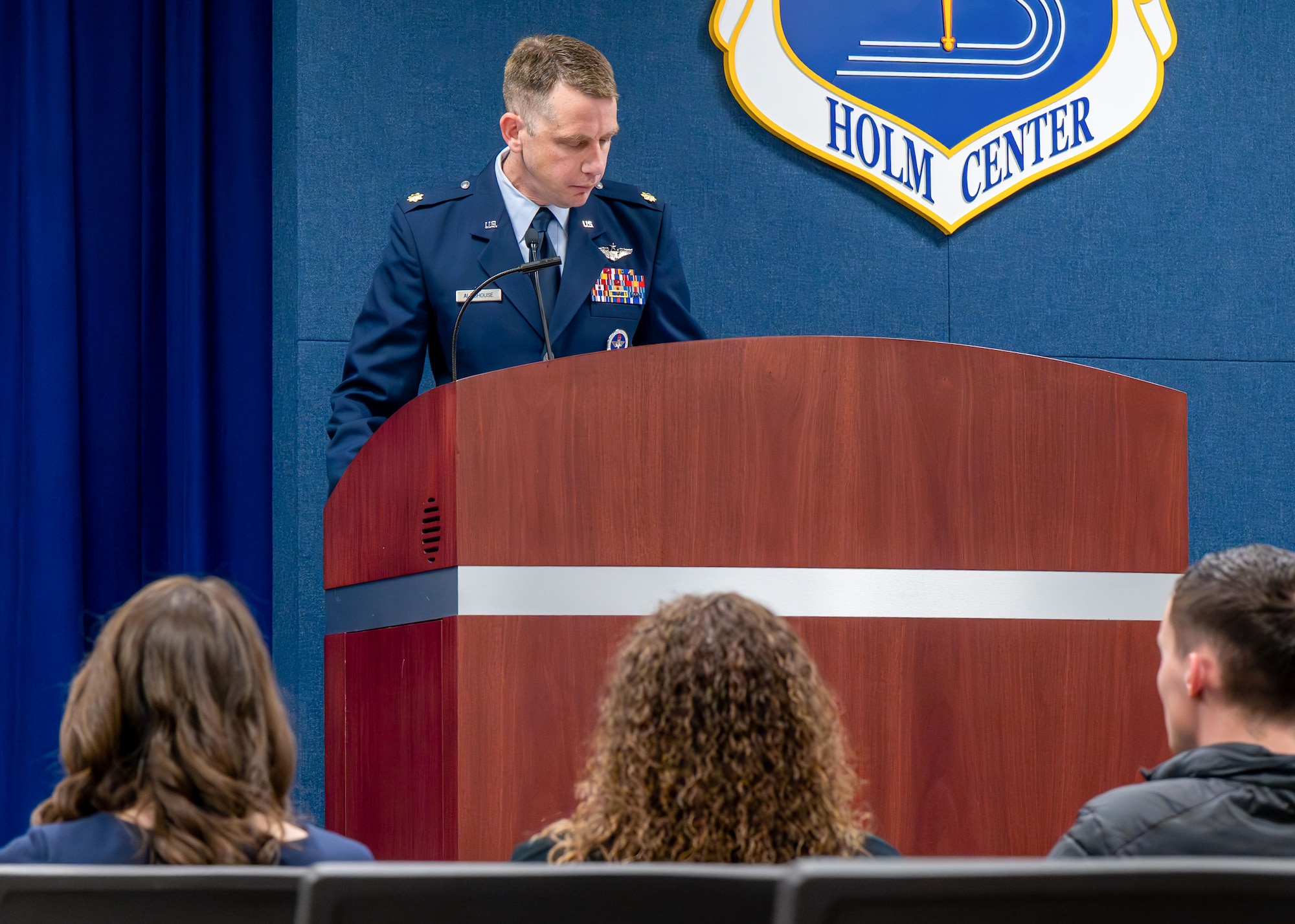 U.S. Air Force Maj. Tanner Allshouse, Warrant Officer Training School commandant, delivers remarks during a transfer of service ceremony for Chief Warrant Officer 5, Jason Godwin, Warrant Officer Training School advisor to the commandant, at Maxwell Air Force Base,
Alabama, Jan. 30, 2026. The ceremony included a final recognition of his Army service before Allshouse, administered the Air Force Oath of Office, officially bringing the CW5 rank back into active-duty Air Force files.