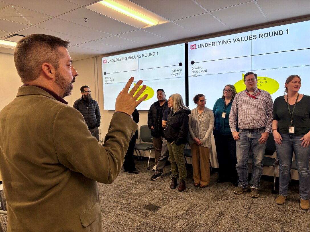 Course instructors Dave Nelson, Stacy Langsdale and Jenn Miller stand together during the Effective Communication for the FUDS Program training at the U.S. Army Corps of Engineers Sacramento District.