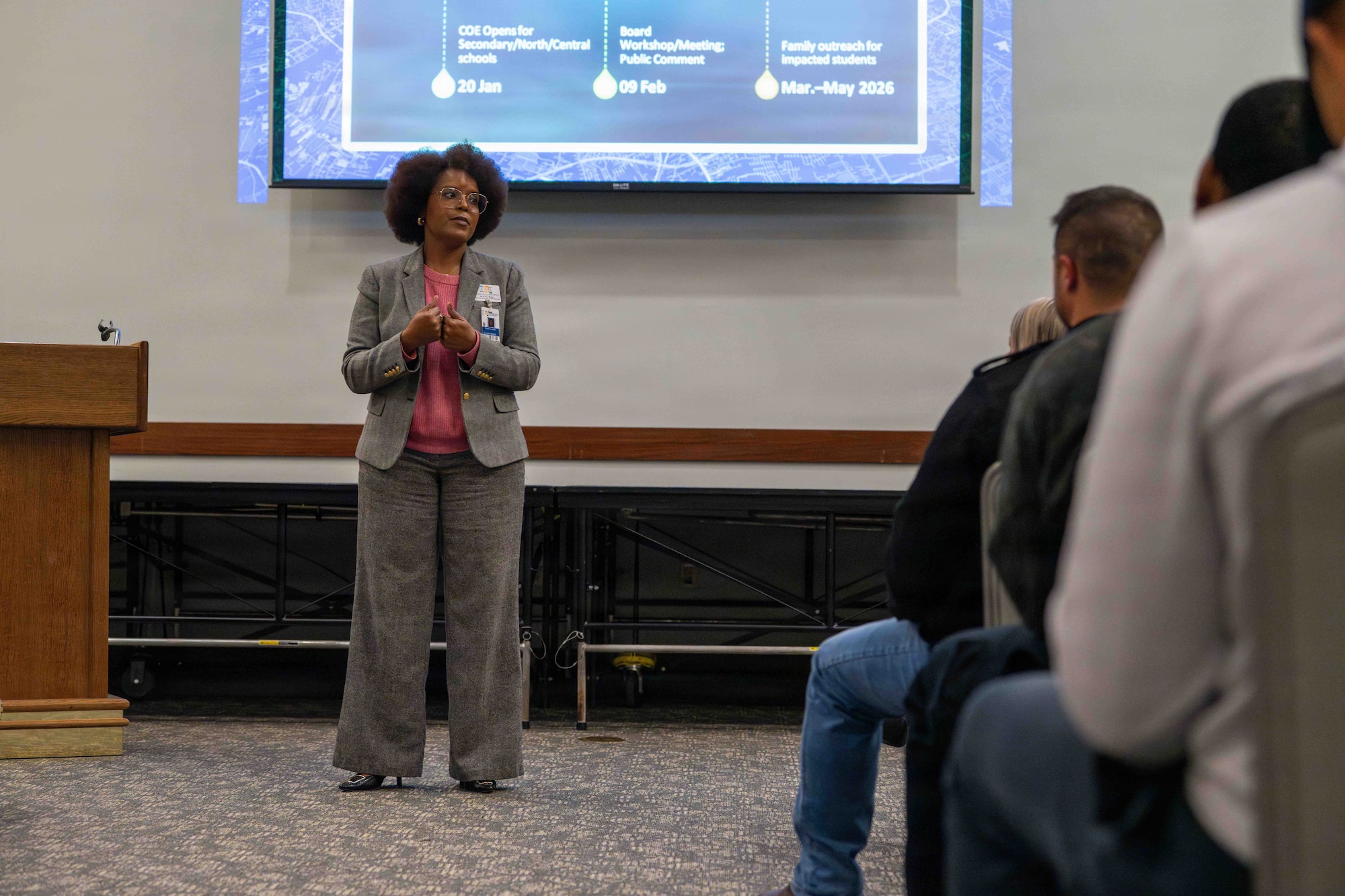 Duscha Ross, Okaloosa County School District program director, speaks during a town hall at Hurlburt Field, Florida, Jan. 22, 2026. The town hall aimed to answer base community questions on recent proposals affecting the installation, including school rezoning and the future of Mary Esther and Longwood Elementary schools, to provide a continuum of quality education for military-connected students.