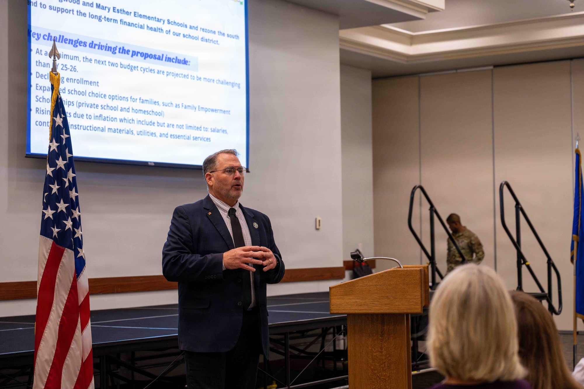 John Spolski, Okaloosa County School District assistant superintendent, speaks during a town hall at Hurlburt Field, Florida, Jan. 22, 2026. The town hall aimed to foster a two-way conversation with military families, offering transparency and clarification on recent decisions impacting the base community and ensuring a continuum of quality education for military-connected students.