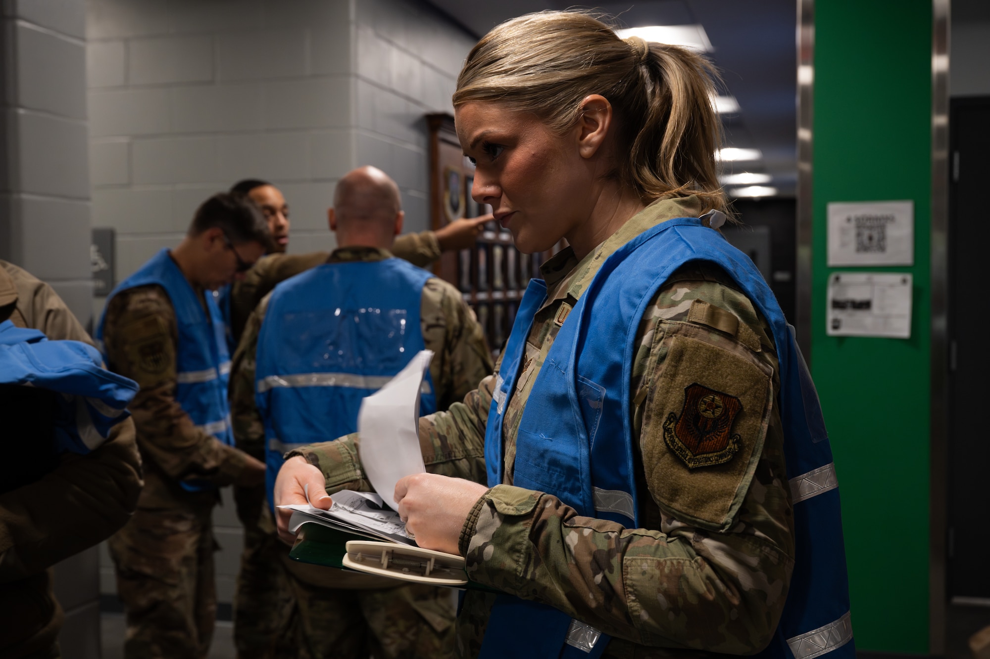 A Wing Inspection Team member assigned to the 1st Special Operations Wing prepares to grade active-shooter response procedures during an exercise at Hurlburt Field, Florida, Jan. 28, 2026.