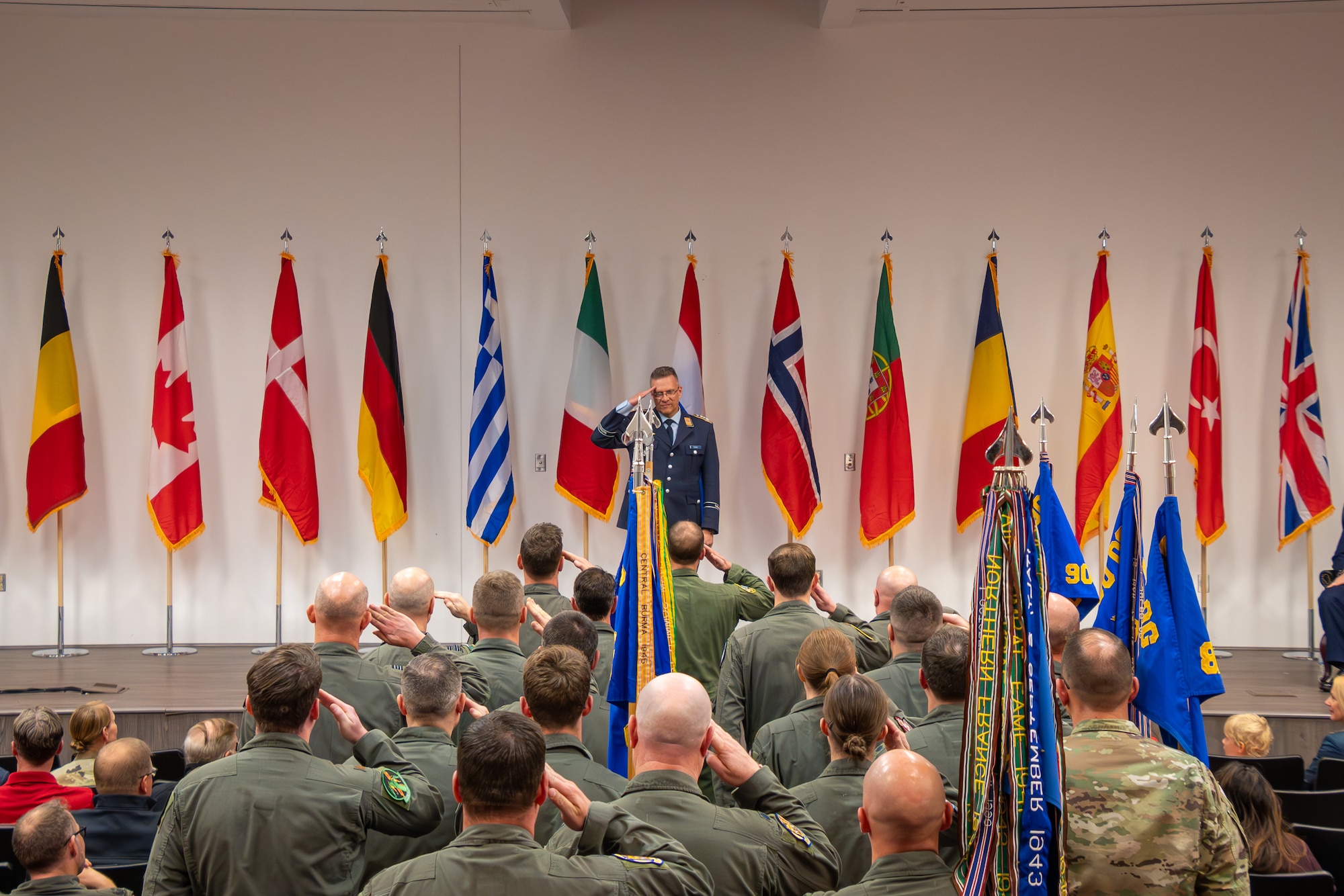 German Air Force Col. Timo Heimbach receives his first salture as Commander of the 80th Operations Group during a ceremony
