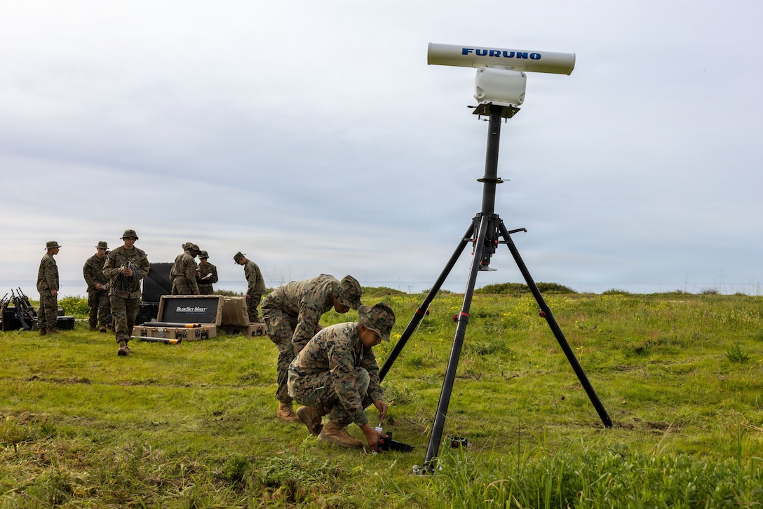 U.S. Marines with Battlespace Surveillance Company, 1st Intelligence Battalion, I Marine Expeditionary Force Information Group, establish a command operations center during a maritime sensing and infantry tactics training exercise at Marine Corps Base Camp Pendleton, California, Jan. 28, 2026. The training allows I MIG Marines to refine advanced battle tracking skills to detect, identify, and monitor friendly forces, providing real-time situational awareness for commanders across the battlespace. (U.S. Marine Corps photo by Cpl. Angelina Sara)