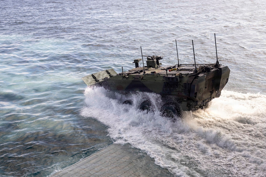 A U.S. Marine Corps Amphibious Combat Vehicle with 3rd Assault Amphibian Battalion, 1st Marine Division, disembarks from Wasp-class amphibious assault ship USS Makin Island (LHD 8), during Quarterly Underway Amphibious Readiness Training 26.2, off the coast of California, Jan. 23, 2026.