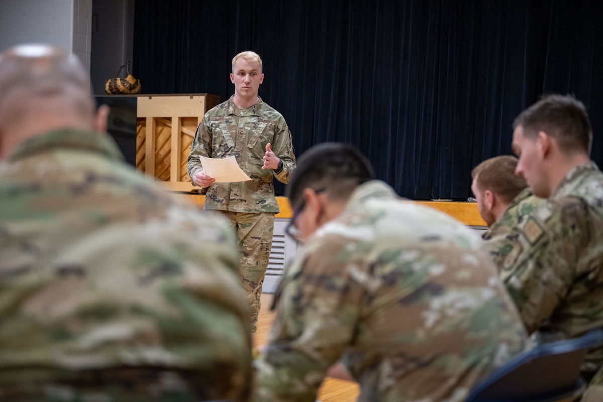 Staff Seargeant Robert Day, 88th Comptroller Squadron, leads the 5/6 council meeting. The 5/6 council is a professional organization of Junior Non-Commissioned Officers that provides mentorship, development, and community service to the junior enlisted force. (U.S. Air Force photo by Jack Gardner)