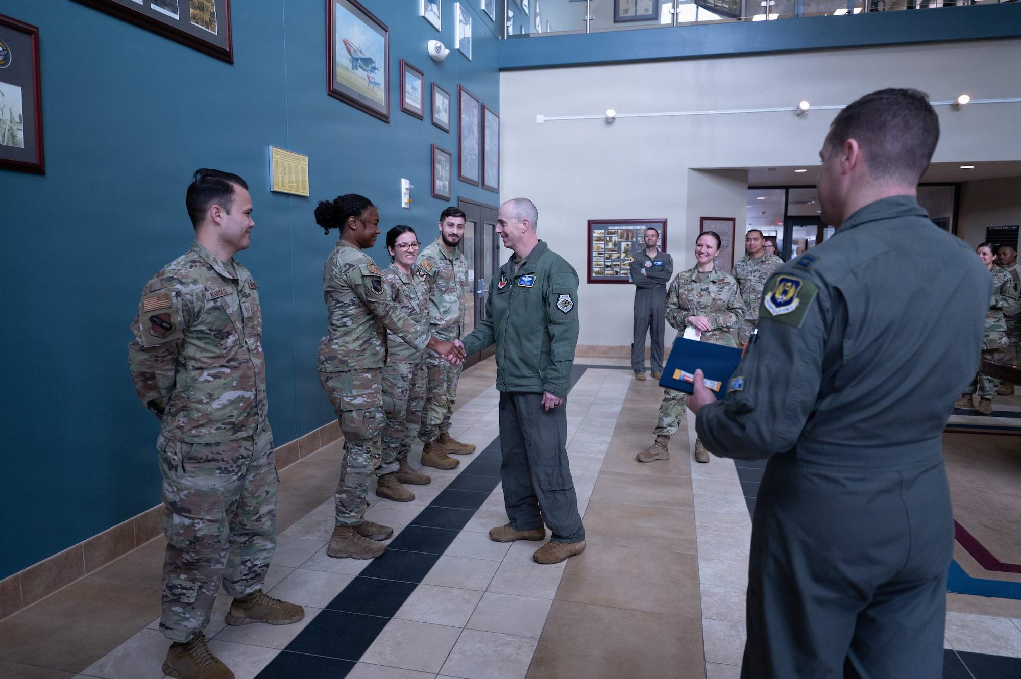 U.S. Air Force Maj. Gen. Steven Behmer, 15th Air Force commander, coins an Airmen assigned to the 4th Support Squadron during a visit to Seymour Johnson Air Force Base, North Carolina, Feb. 4, 2026. Behmer visited Seymour Johnson AFB to gain a firsthand look at the 4th Fighter Wing’s infrastructure, day-to-day operations, and to meet with Airmen. (U.S. Air Force photo by Airman 1st Class Kevin Cumpa)