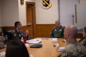 U.S. Air Force Maj. Gen. Steven Behmer, 15th Air Force commander, receives a briefing on the F-15E Strike Eagle during his visit to Seymour Johnson Air Force Base, North Carolina, Feb. 4, 2026. Behmer visited Seymour Johnson AFB to gain a firsthand look at the 4th Fighter Wing’s infrastructure, day-to-day operations, and to meet with Airmen. (U.S. Air Force photo by Airman 1st Class Kevin Cumpa)