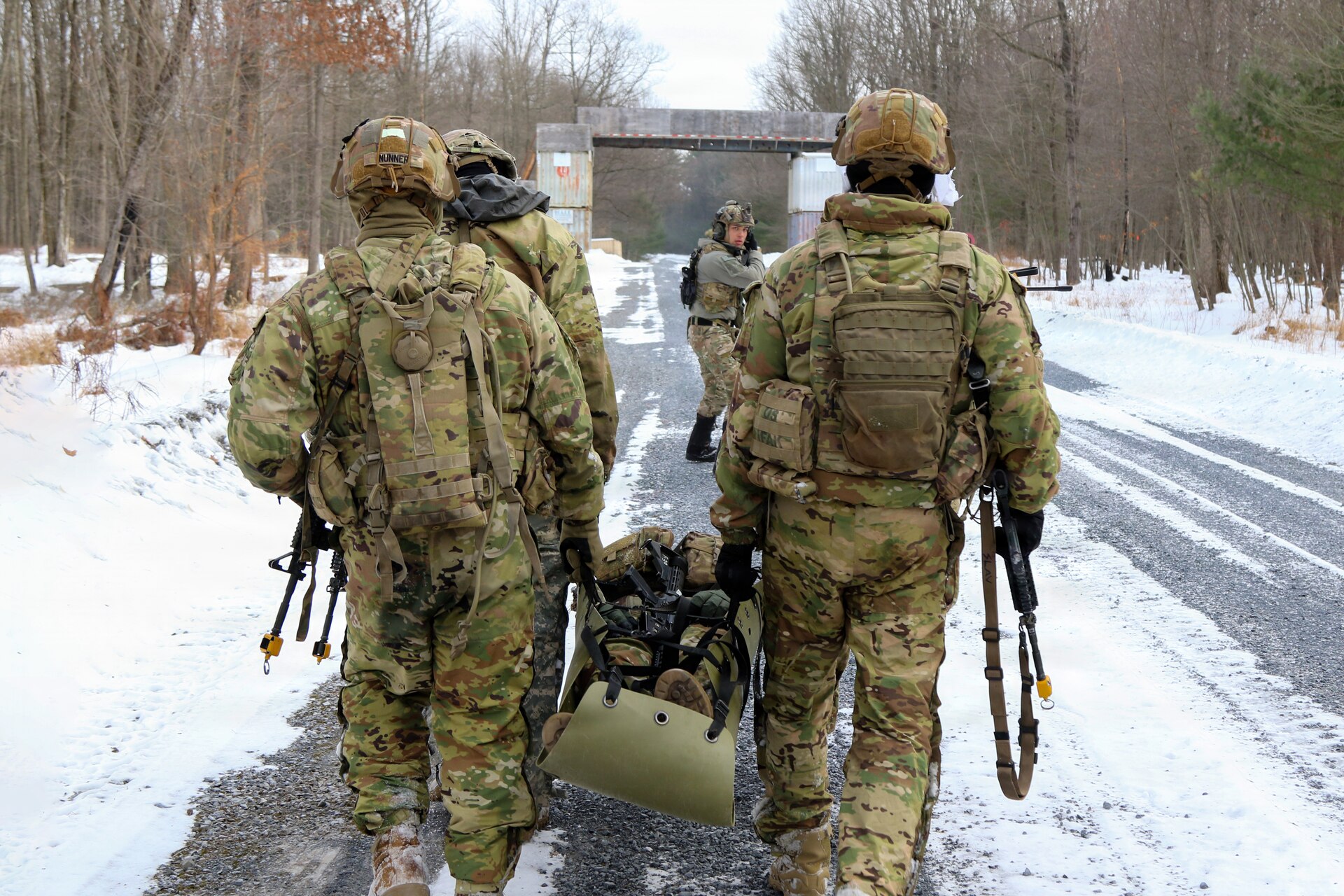 U.S. Army Soldiers attending the Infantry Advanced Leader Course conduct a field training exercise at the 166th Regiment – Regional Training Institute, Fort Indiantown Gap, Pennsylvania, Feb. 2-3, 2025. The exercise tests leadership, planning and small-unit tactics in a simulated operational environment. (U.S. Army photo by Sgt. 1st Class Shane Smith)