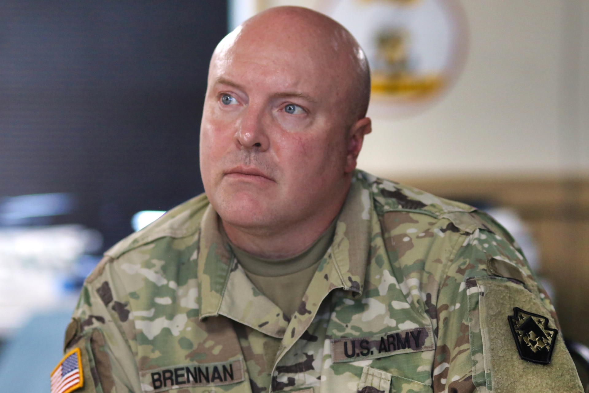 U.S. Army Sgt. Glenn Brennan, a public affairs specialist assigned to the 109th Mobile Public Affairs Detachment, 213th Regional Support Group, Pennsylvania Army National Guard, listens during a land navigation class at Fort Indiantown Gap, Pennsylvania, July 15, 2025. 109th MPAD Soldiers were instructed on map reading fundamentals, terrain association and compass use during annual training. (U.S. Army National Guard photo by Sgt. Du-Marc Mills)