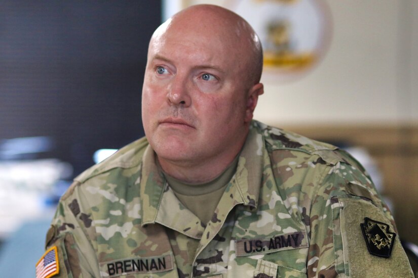 U.S. Army Sgt. Glenn Brennan, a public affairs specialist assigned to the 109th Mobile Public Affairs Detachment, 213th Regional Support Group, Pennsylvania Army National Guard, listens during a land navigation class at Fort Indiantown Gap, Pennsylvania, July 15, 2025. 109th MPAD Soldiers were instructed on map reading fundamentals, terrain association and compass use during annual training. (U.S. Army National Guard photo by Sgt. Du-Marc Mills)