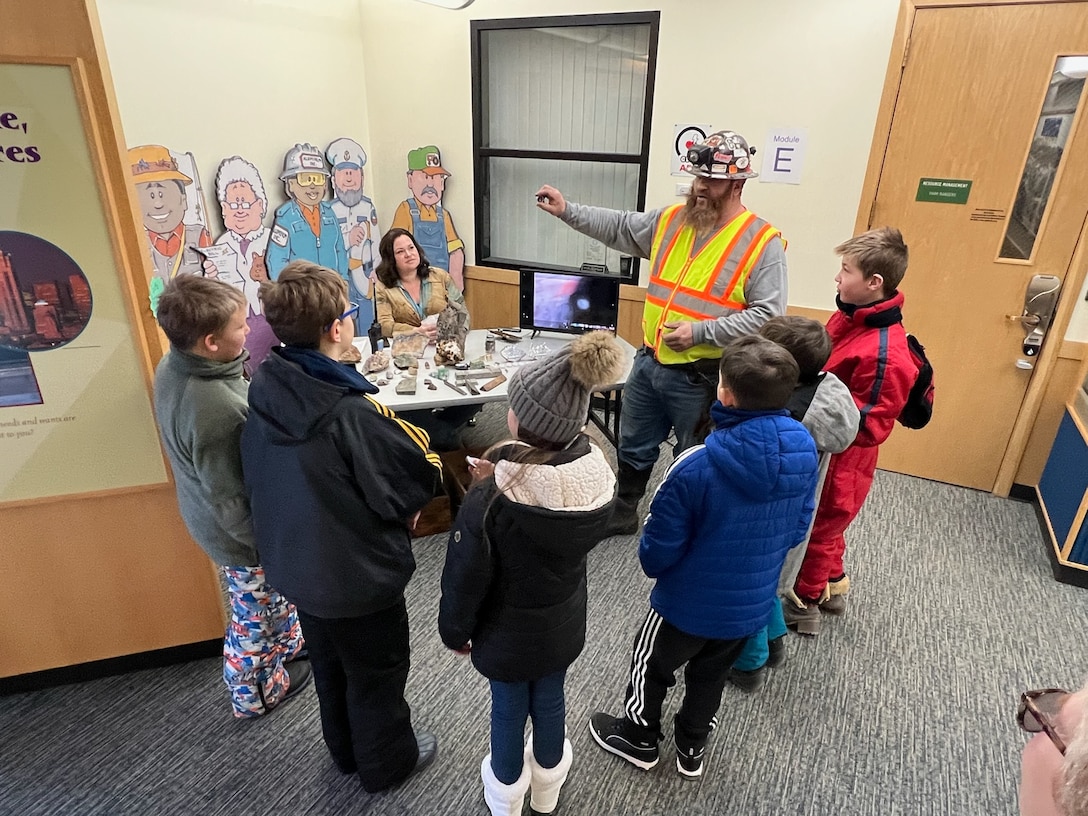 Photo of mining expert Robert Viergutz teaching a groups of elementary school-aged students local mining history and how to identity rocks and minerals, during the Friends of Scotchman Peak Wilderness 12th annual "Winter Tracks" event, Jan. 23 and 29, 2026. Libby Dam, a U. S. Army Corps of Engineers operating project in Libby, Montana, hosted the event on both days.