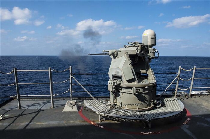 SOUTH CHINA SEA - Arleigh Burke-class guided-missile destroyer USS Mustin (DDG 89) fires its MK 38 25 mm gun during a live-fire drill in 2015. The weapon has since been upgraded to MK 38 MOD 4, which employes a 30 mm gun and integrates with the Aegis Combat System. (U.S. Navy photo by Mass Communication Specialist Seaman David Flewellyn/Released)