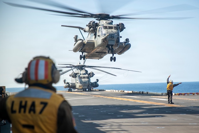 A CH-53 Super Stallion attached to the Marine Medium Tiltrotor Squadron (VMM) 265 lands on the flight deck of the America-class amphibious assault ship USS Tripoli (LHA 7), during flight operations Feb. 4, 2026.