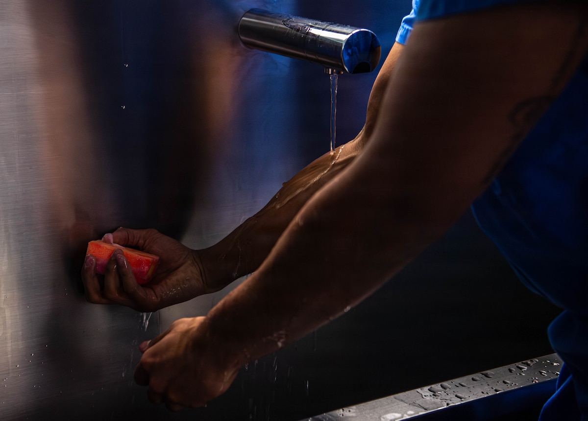 U.S. Air Force Airman 1st Class Brian Smith, 86th Dental Squadron oral surgery technician, washes his hands before a surgery at Landstuhl Regional Medical Center, Germany, Jan. 29, 2026.