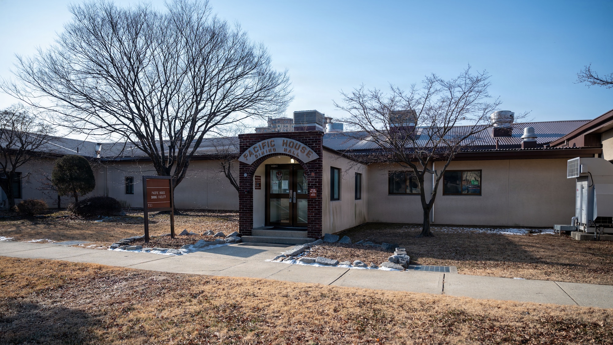 The 51st Force Support Squadron hosts the last meal at the Pacific House Dining Facility closing ceremony at Osan Air Base, Republic of Korea, Jan. 30, 2026. Built in 1958, the facility stands as a lasting symbol of Osan’s history and enduring support to Airmen across generations. The building’s closure marks the end of service for the Air Force’s oldest operational dining facility. (U.S. Air Force photo by Senior Airman Rome Bowermaster)