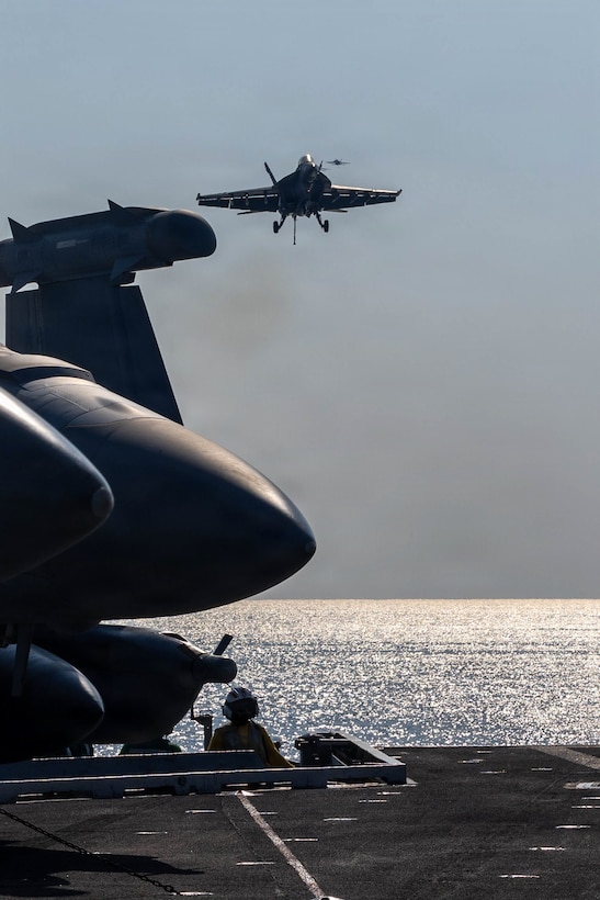An F/A-18F Super Hornet, attached to Strike Fighter Squadron (VFA) 41, prepares to make an arrested landing on the flight deck of Nimitz-class aircraft carrier USS Abraham Lincoln (CVN 72) in the Arabian Sea, Jan. 30. Abraham Lincoln is deployed to the U.S. 5th Fleet area of operations to support maritime security and stability in the U.S. Central Command area of responsibility. (U.S. Navy photo by Mass Communication Specialist Seaman Hannah Tross)