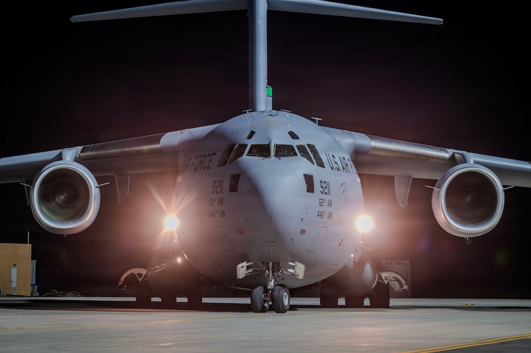 A U.S. Air Force C-17 Globemaster III aircraft taxis on a runway after arriving in the in the U.S. Central Command area of responsibility, Jan. 20, 2026.