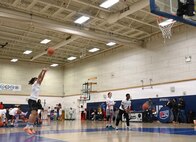 Military dependents participate in basketball shooting drills during a Hoops for Troops event at Joint Base Anacostia-Bolling, Washington, D.C., Jan. 23, 2026. The Washington Wizards hosted Hoops for Troops which is an NBA program that is dedicated to honoring service members, veterans and their families by supporting military communities. (U.S. Air Force photo by Tech. Sgt. Sergio A. Gamboa)