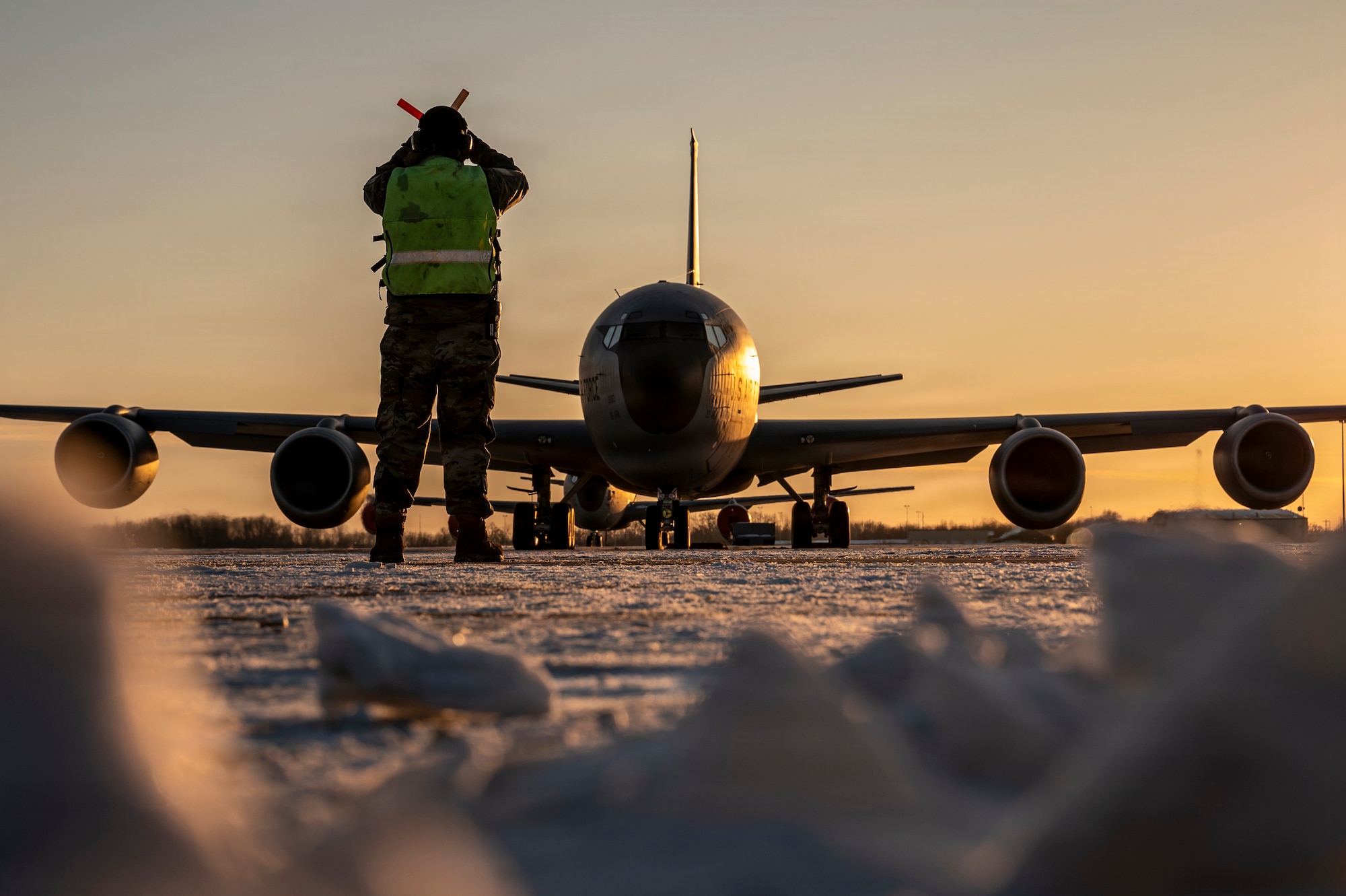 Airman marshaling KC-135