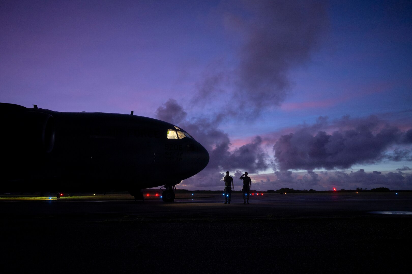 C-17 parked on flightline at night
