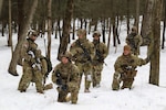 U.S. Army Soldiers attending the Infantry Advanced Leader Course conduct a field training exercise at the 166th Regiment – Regional Training Institute, Fort Indiantown Gap, Pennsylvania, Feb. 2-3, 2026. The exercise tests leadership, planning and small-unit tactics in a simulated operational environment. Photo by Sgt. 1st Class Shane Smith.
