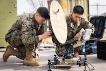 U.S. Marines from around II Marine Expeditionary Force receive training on the Multi-Mission communications terminal during a Commercial Satellite Communication Operator Course at Marine Corps Base Camp Lejeune, Dec. 17, 2025. The purpose of CSOC is to provide knowledge and hands on training with commercial off-the-shelf communication equipment to modernize communication efforts in accordance with Force Design. (U.S. Marine Corps photo by Staff Sgt. Gavin Umboh)