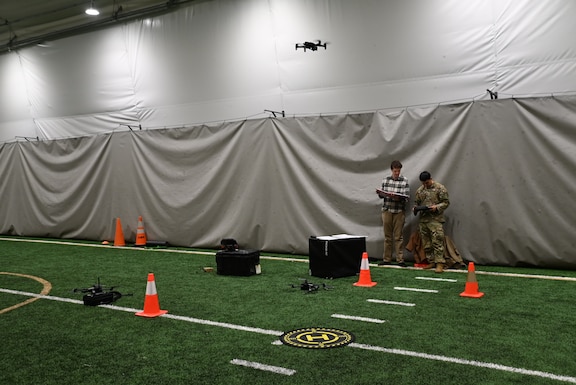Soldiers from Keller Army Community Hospital conduct indoor drone training to become proficient with the Unmanned Aircraft Systems (sUAS). The training is one of many step for Keller's Project MARS which is actively working to integrate drone technology into military medical operations to enhance Warfighter's health and safety.