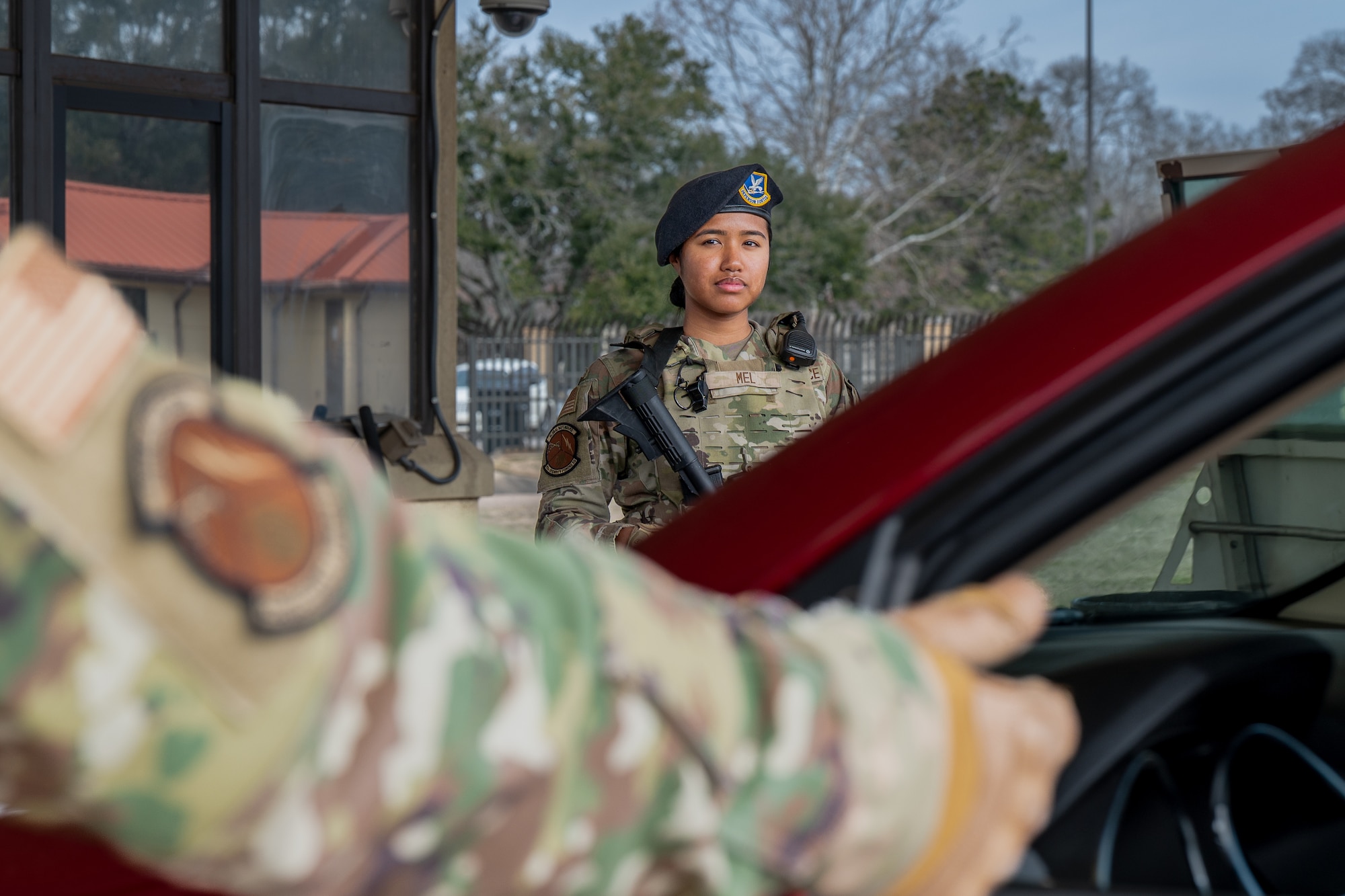 U.S. Air Force Airman Destiny Mel, 42d Security Forces Squadron entry controller, carries her M4 carbine at the main gate on Maxwell Air Force Base, Alabama, Feb. 3, 2026.