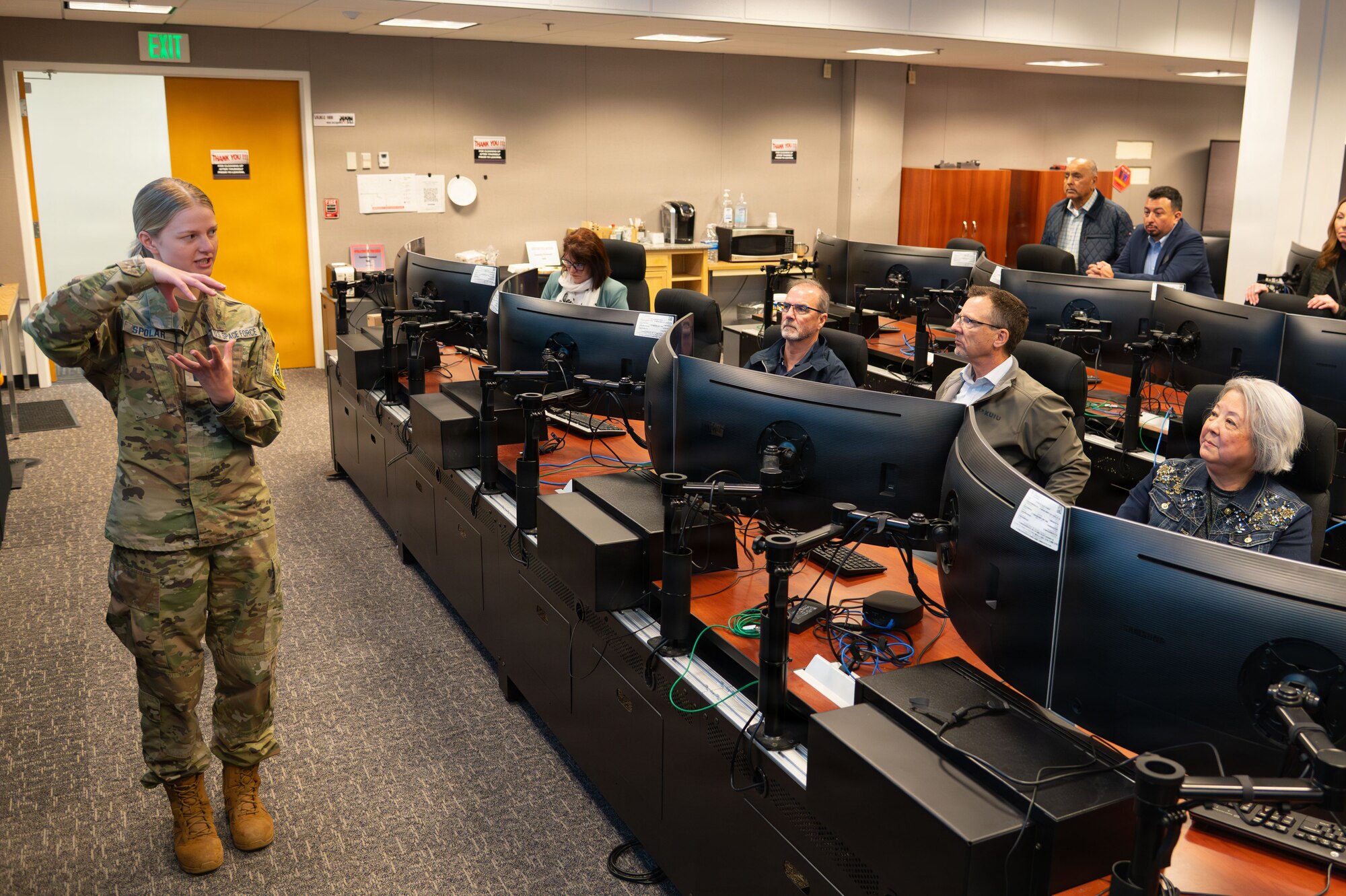 a person speaks to a classroom