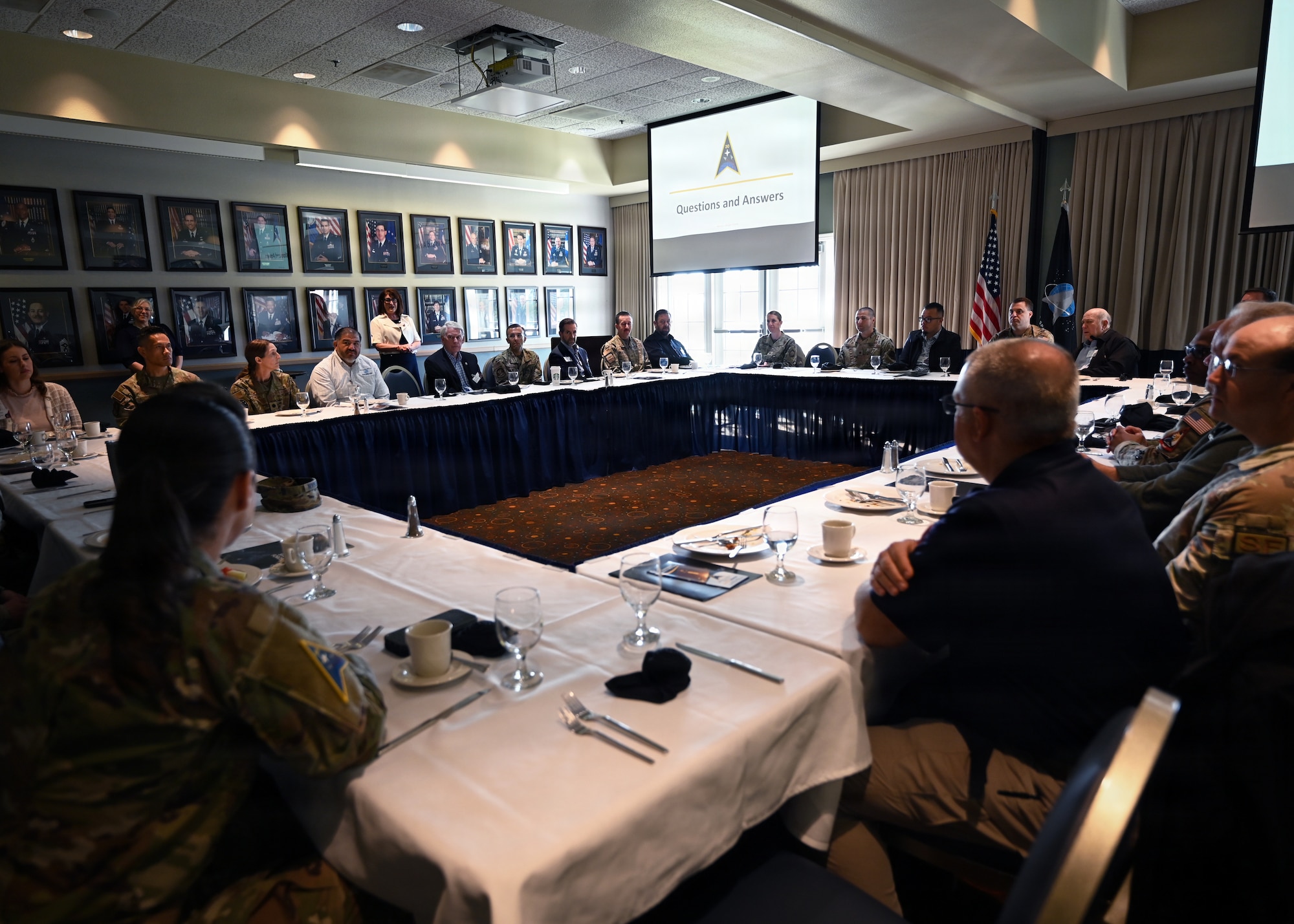 People sit in a room.