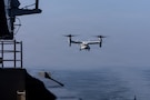A CMV-22B Osprey, attached to Fleet Logistics Support Squadron (VRC) 40 prepares to land on the flight deck of Nimitz-class aircraft carrier USS Abraham Lincoln (CVN 72) in the Arabian Sea, Feb. 7, 2026. Abraham Lincoln is deployed to the U.S. 5th Fleet area of operations to support maritime security and stability in the Middle East. (U.S. Navy photo by Mass Communication Specialist Seaman Hannah Tross)