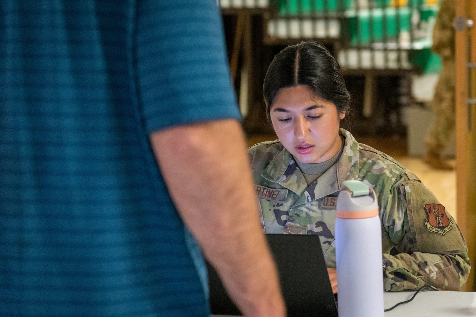 woman works on computer