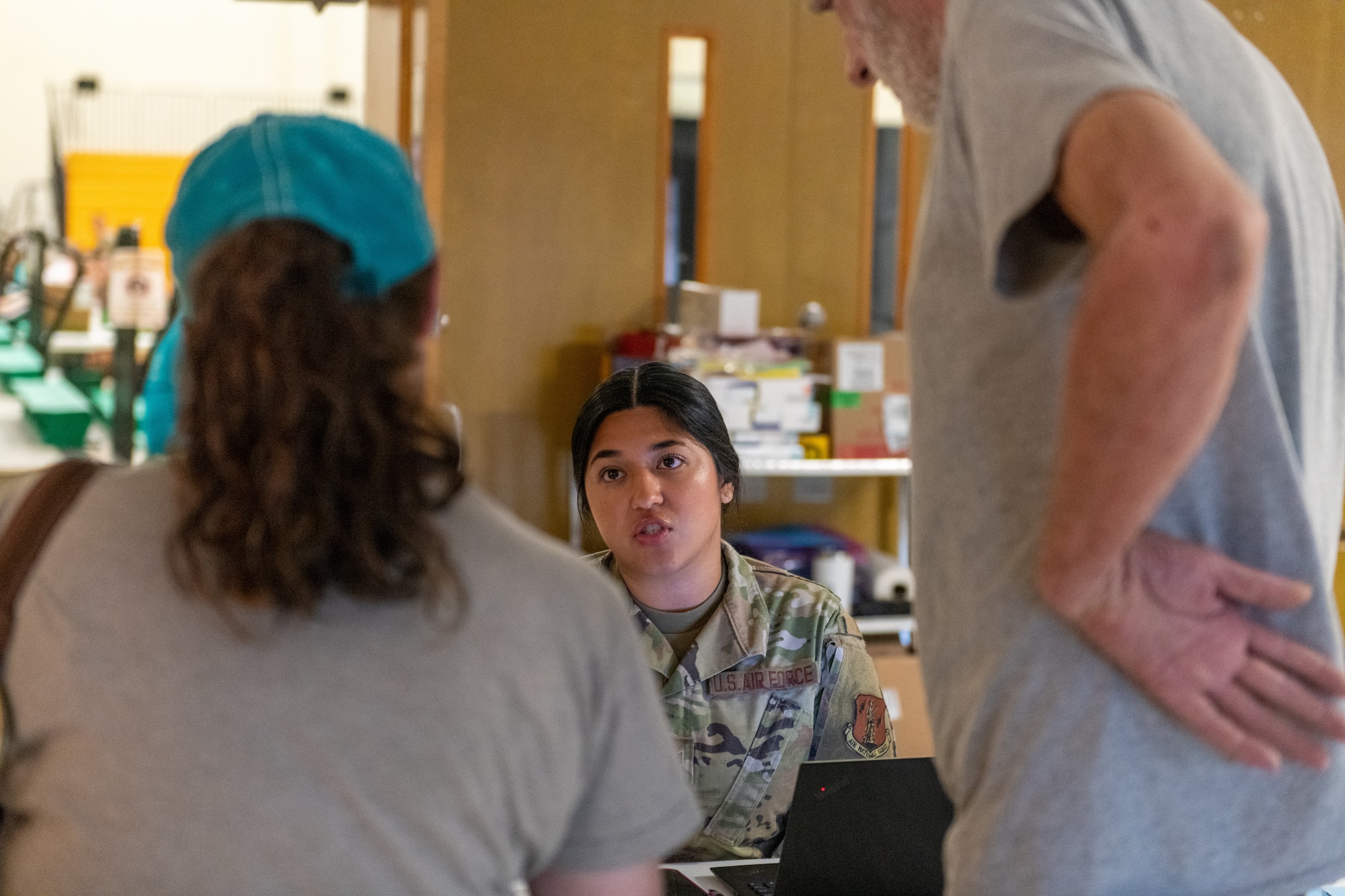 woman speaks to woman