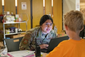 Woman speaks to child