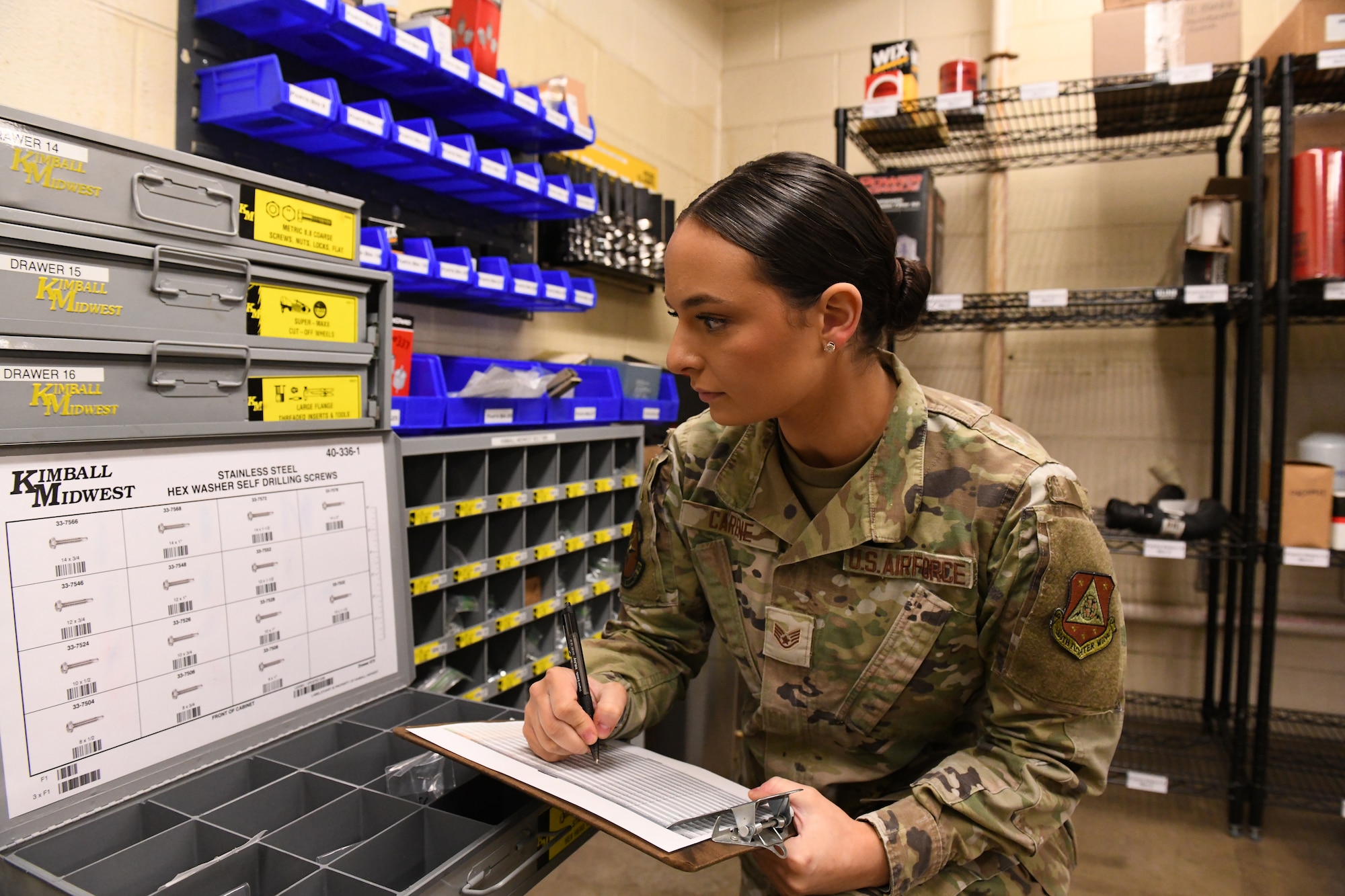 woman takes inventory