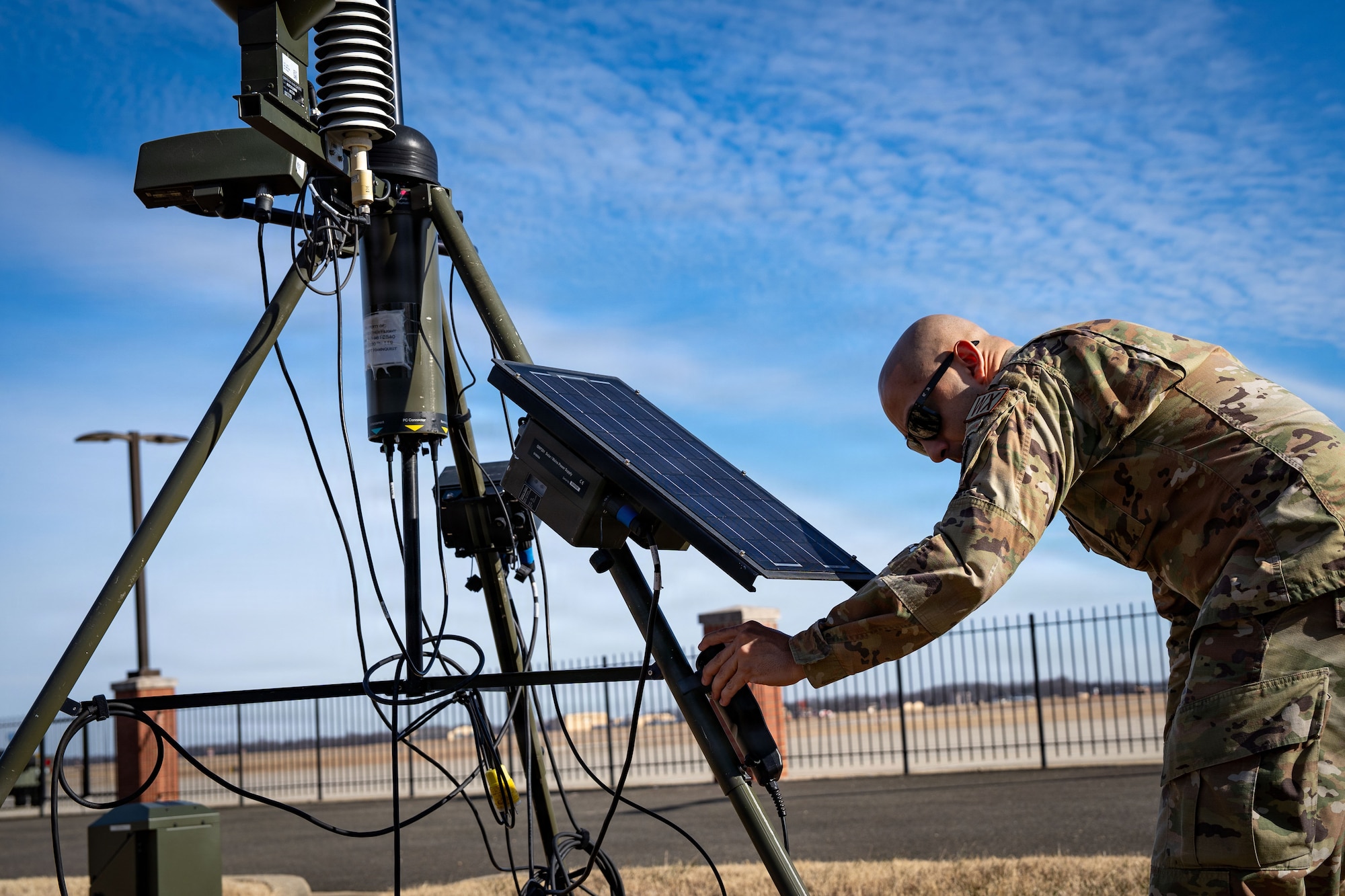 U.S. Air Force Senior Airman Antonio Figueroa, 89th Operations Support Squadron weather forecaster, monitors a Tactical Meteorological Observing System at Joint Base Andrews, Md., Jan. 24, 2026. The 89th OSS weather flight worked around the clock, providing real-time analysis directly to Joint Base Andrews senior leaders to inform critical, time-sensitive decisions as the historic storm evolved. (U.S. Air Force photo by 1st Lt. Alexis Kula)